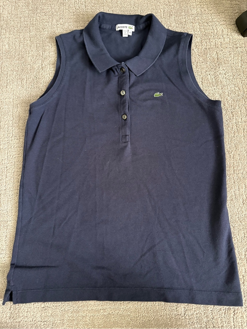 Lacoste Navy Sleeveless women’s Polo with classic Lacoste Logo